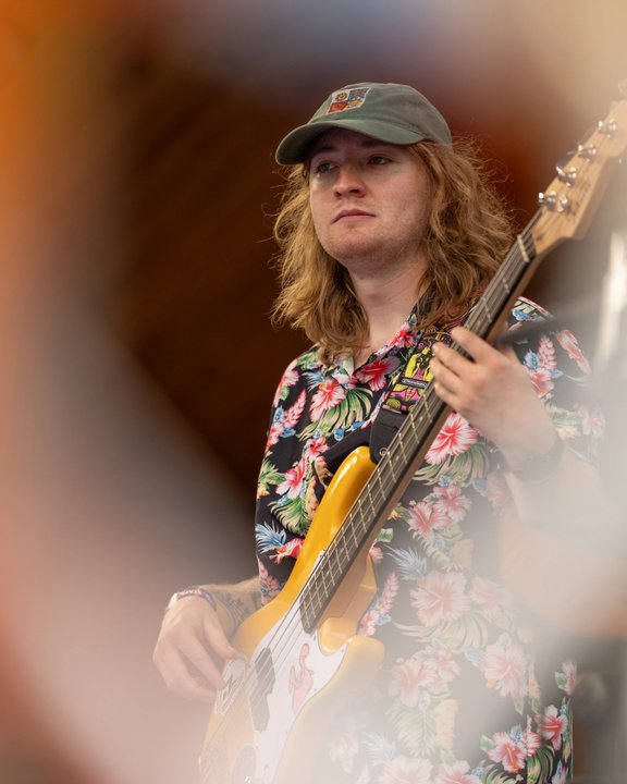 Bassist performing outdoors
