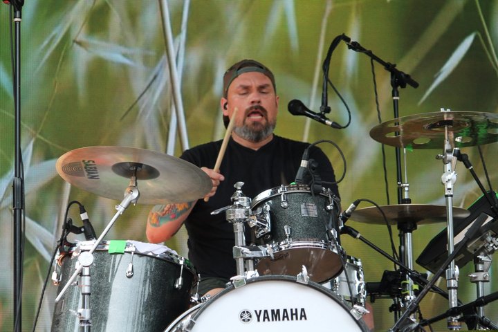 Drummer performing on the outdoor stage