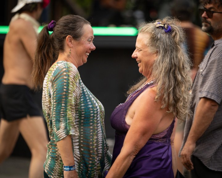 Two festival attendees smiling together