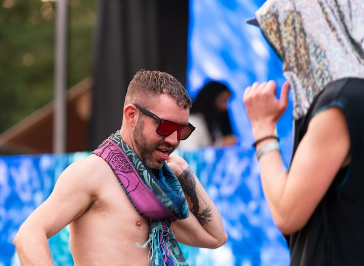 Festival attendee dancing outdoors